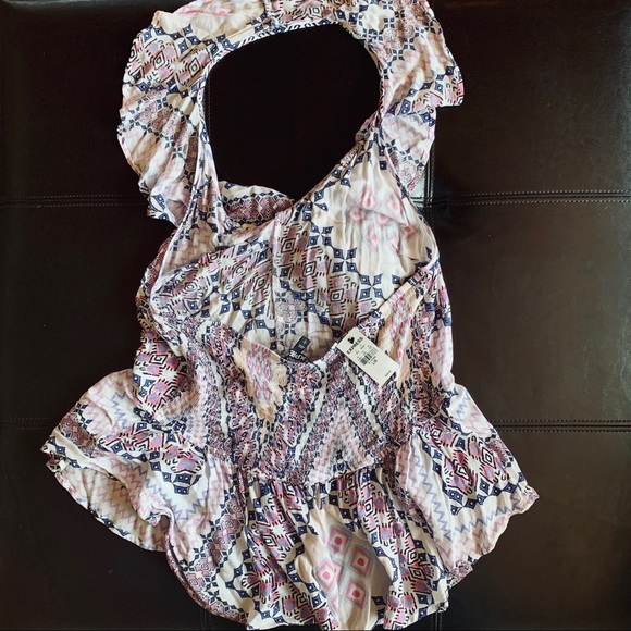 Express Ruffle Peplem Halter Tank - Picture 2 of 2